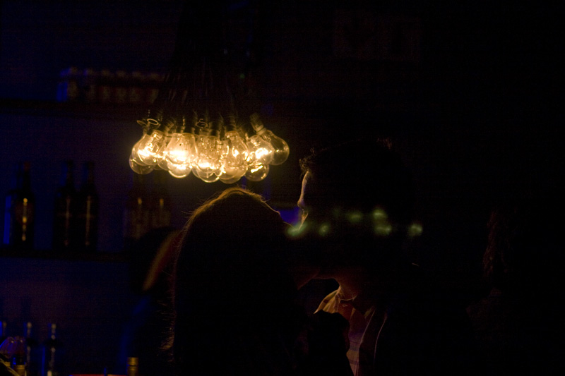 couple kissing under the light